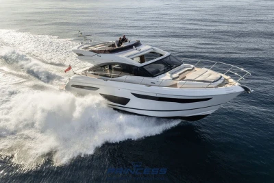 Luxurious 2019 Princess S60 yacht cruising swiftly on open water.