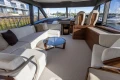 Luxurious interior of 2025 Princess F58 yacht with elegant seating and modern design.