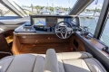 Luxurious 2025 Princess F58 yacht helm with advanced navigation system and elegant interior design.