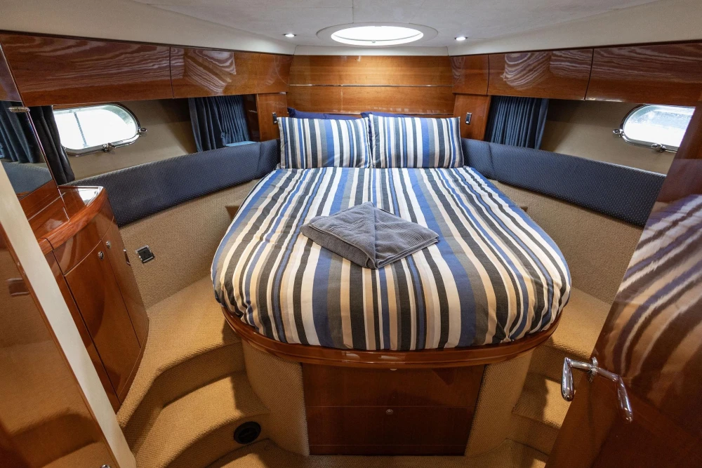 Luxurious cabin interior of 2005 Princess 42 Flybridge Motor Yacht.