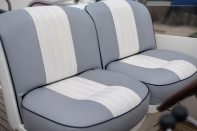 Gray and white cushioned seats on a 2005 Princess 42 Flybridge Motor Yacht.