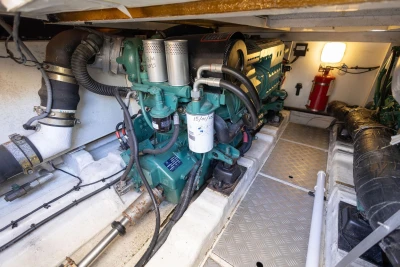 Engine room of a 2005 Princess 42 Flybridge Motor Yacht, showcasing machinery and components.