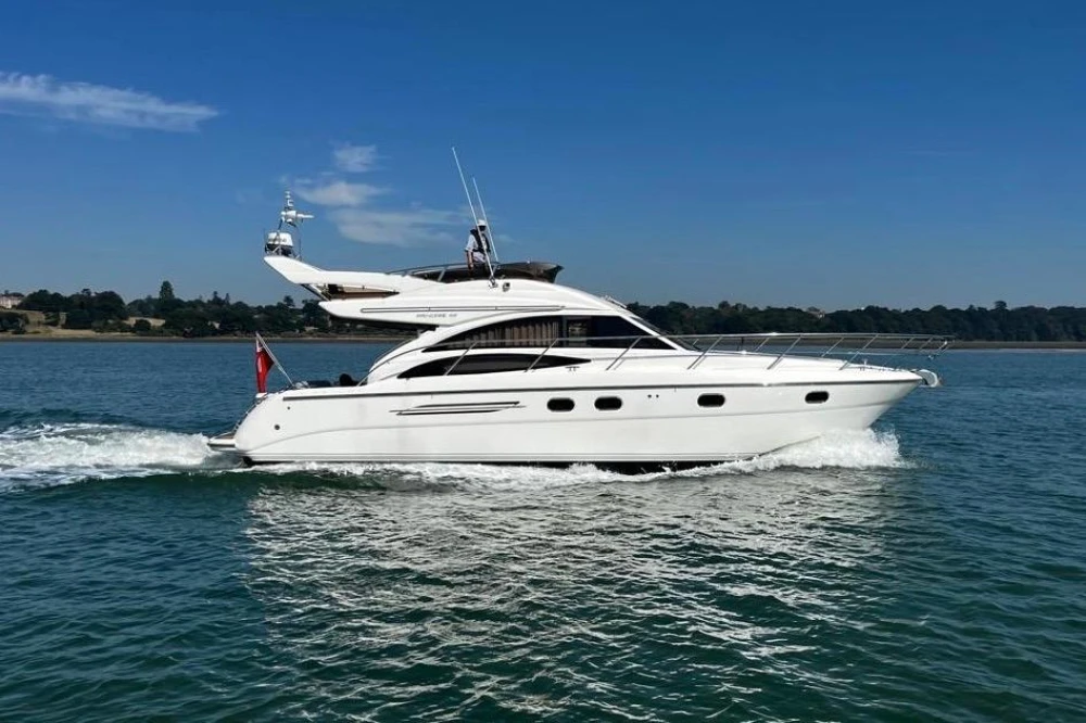 2005 Princess 42 Flybridge Motor Yacht cruising on a sunny day.