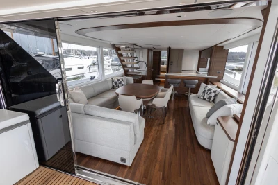 Luxurious interior of 2023 Princess X80 yacht with elegant seating and modern design.