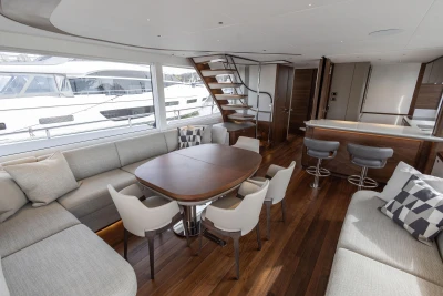 Luxurious interior of 2023 Princess X80 yacht with modern seating and elegant design.