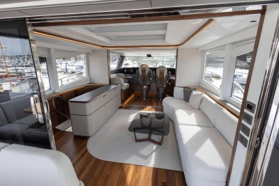Luxurious interior of 2023 Princess X80 yacht with modern seating and elegant design.