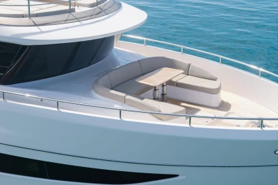 Luxurious 2024 Princess X80 yacht with elegant outdoor seating area on deck.