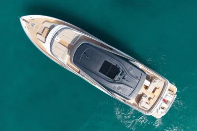 Aerial view of 2024 Princess X80 luxury yacht on clear blue water.
