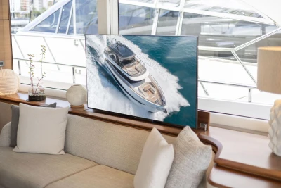 Luxurious interior of 2024 Princess X80 yacht with modern decor and large window view.