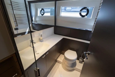 Luxurious bathroom interior of 2024 Princess X80 yacht, featuring modern fixtures and sleek design.