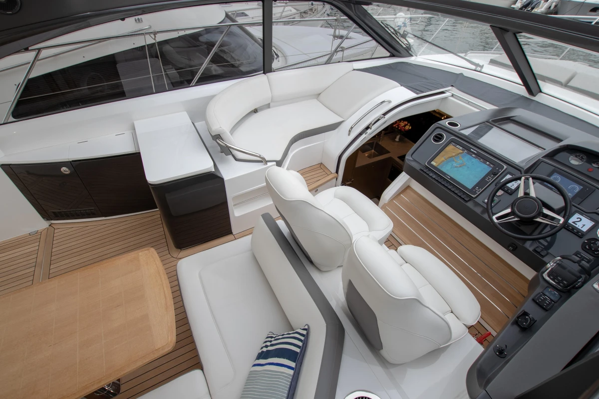 2017 Princess V48 Open yacht interior with modern helm, seating, and navigation system.