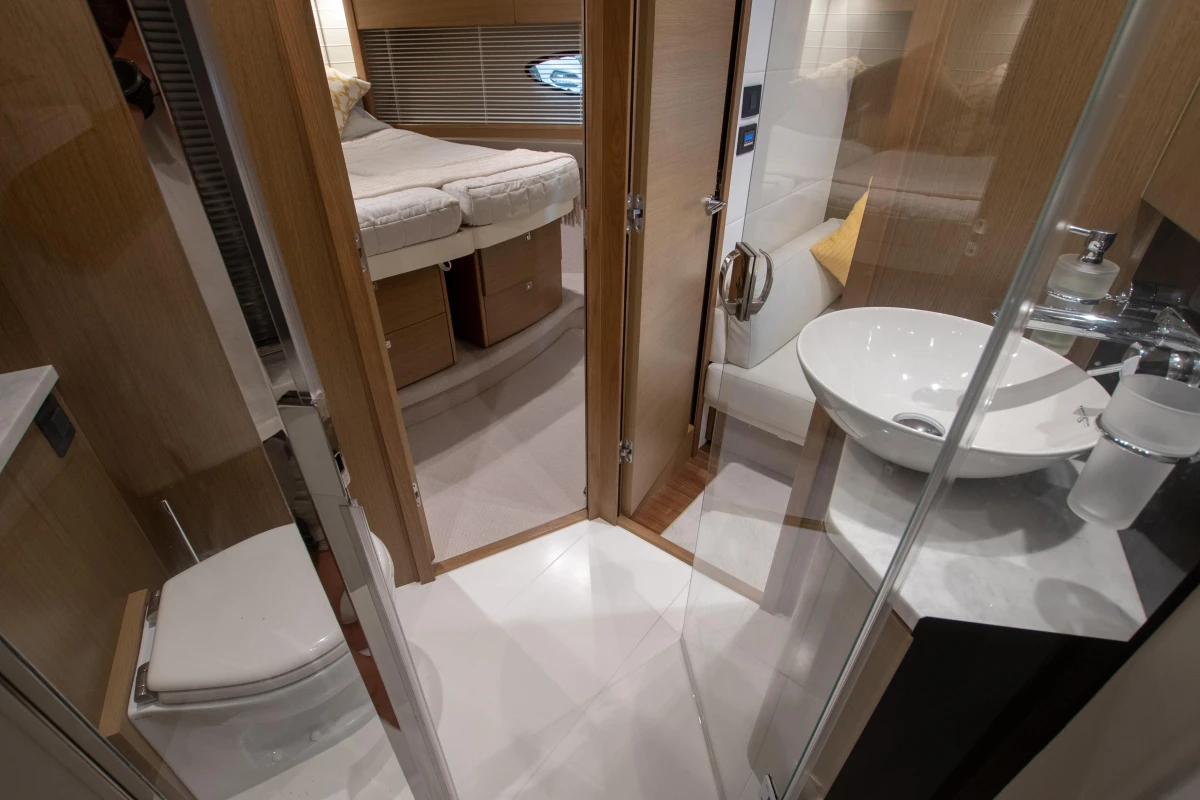 Luxurious bathroom and bedroom interior of 2017 Princess V48 Open yacht.