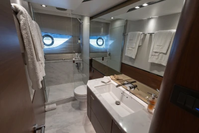Luxurious bathroom in 2018 Princess S65 yacht with modern fixtures and elegant design.
