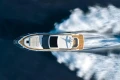Aerial view of 2026 Princess V50 Open yacht cruising on water.