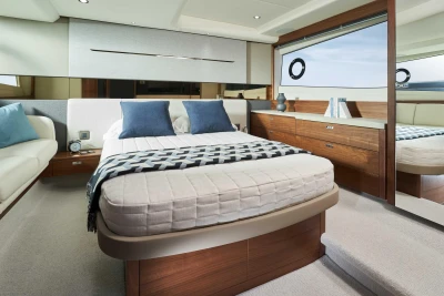 Luxurious interior of 2026 Princess V50 Open yacht with elegant bedroom design.