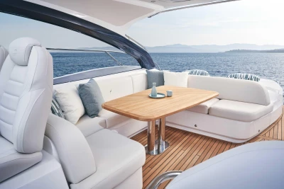 Luxurious 2026 Princess V50 Open yacht interior with elegant seating and ocean view.