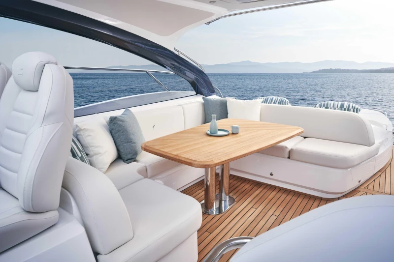 Luxurious 2026 Princess V50 Open yacht interior with elegant seating and ocean view.