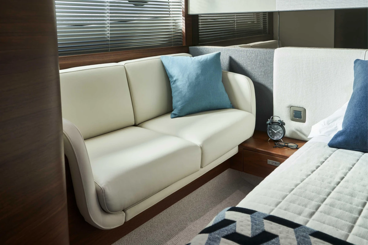 Luxurious interior of 2026 Princess V50 Open yacht with elegant seating and decor.