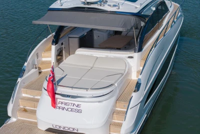 2026 Princess V50 Open yacht with spacious deck and elegant design on water.