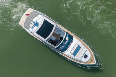 Aerial view of 2026 Princess V50 Open yacht cruising on calm waters.