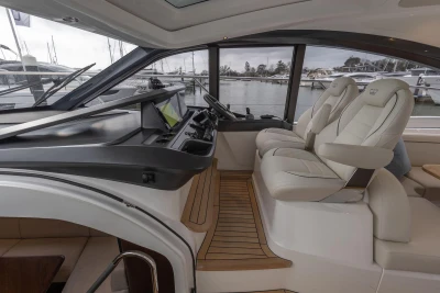 Interior of 2026 Princess V50 Open yacht with luxurious seating and modern dashboard.
