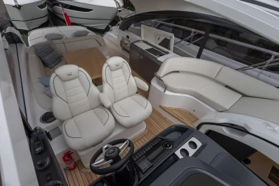Luxurious interior of 2026 Princess V50 Open yacht with plush seating and modern design.