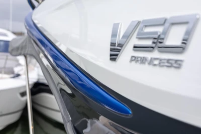 2026 Princess V50 Open yacht, sleek design with chrome logo detail.