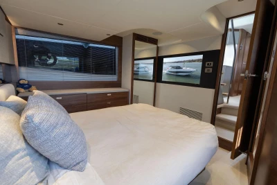 Luxurious bedroom interior of 2026 Princess V50 Open yacht with modern design.