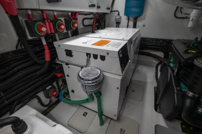 Engine room of 2026 Princess V50 Open yacht, featuring electrical systems and components.