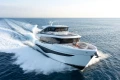 2026 Princess X80 yacht cruising on open sea, showcasing luxury and elegance.