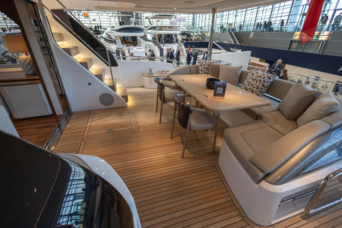 Luxurious 2026 Princess X80 yacht interior with elegant seating and dining area.