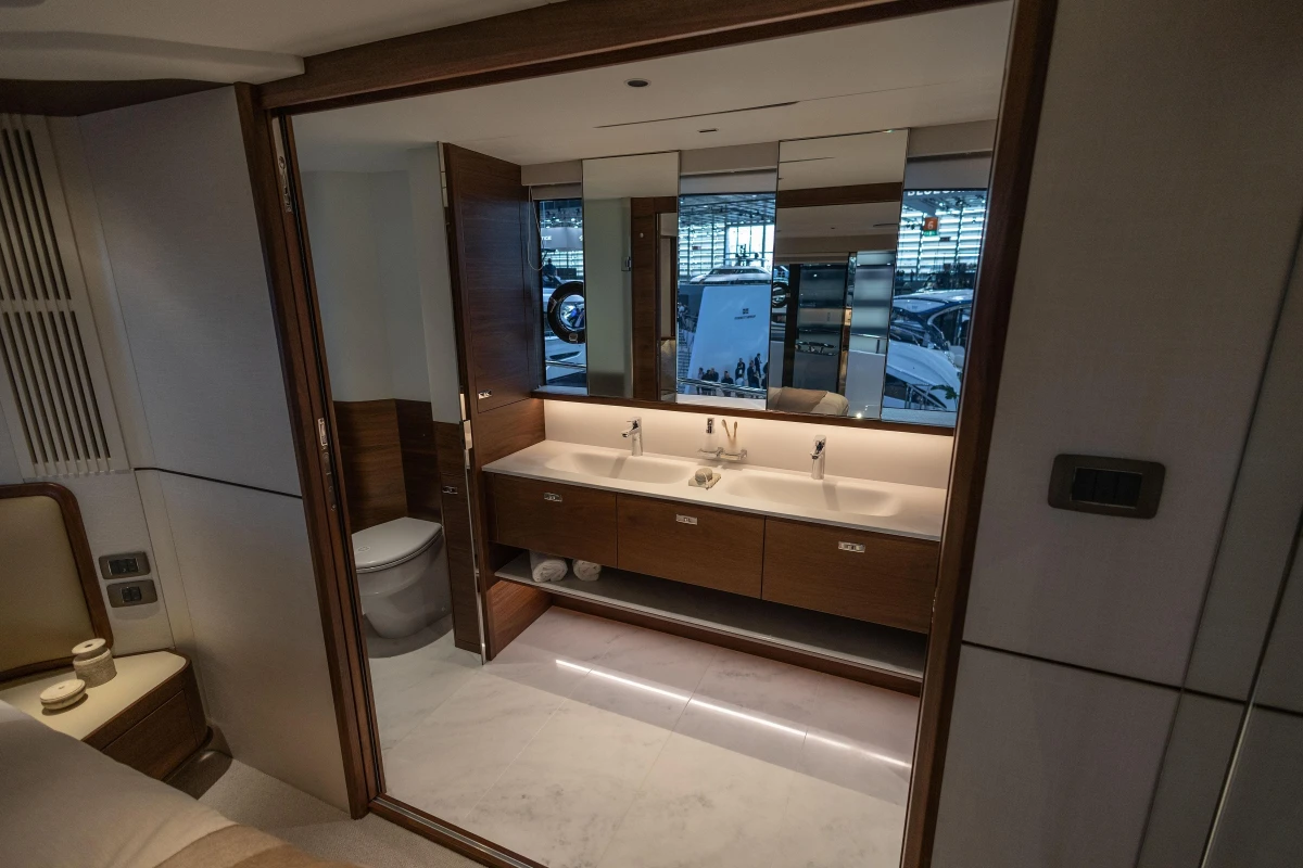 Luxurious bathroom interior of 2026 Princess X80 yacht, featuring dual sinks and modern design.