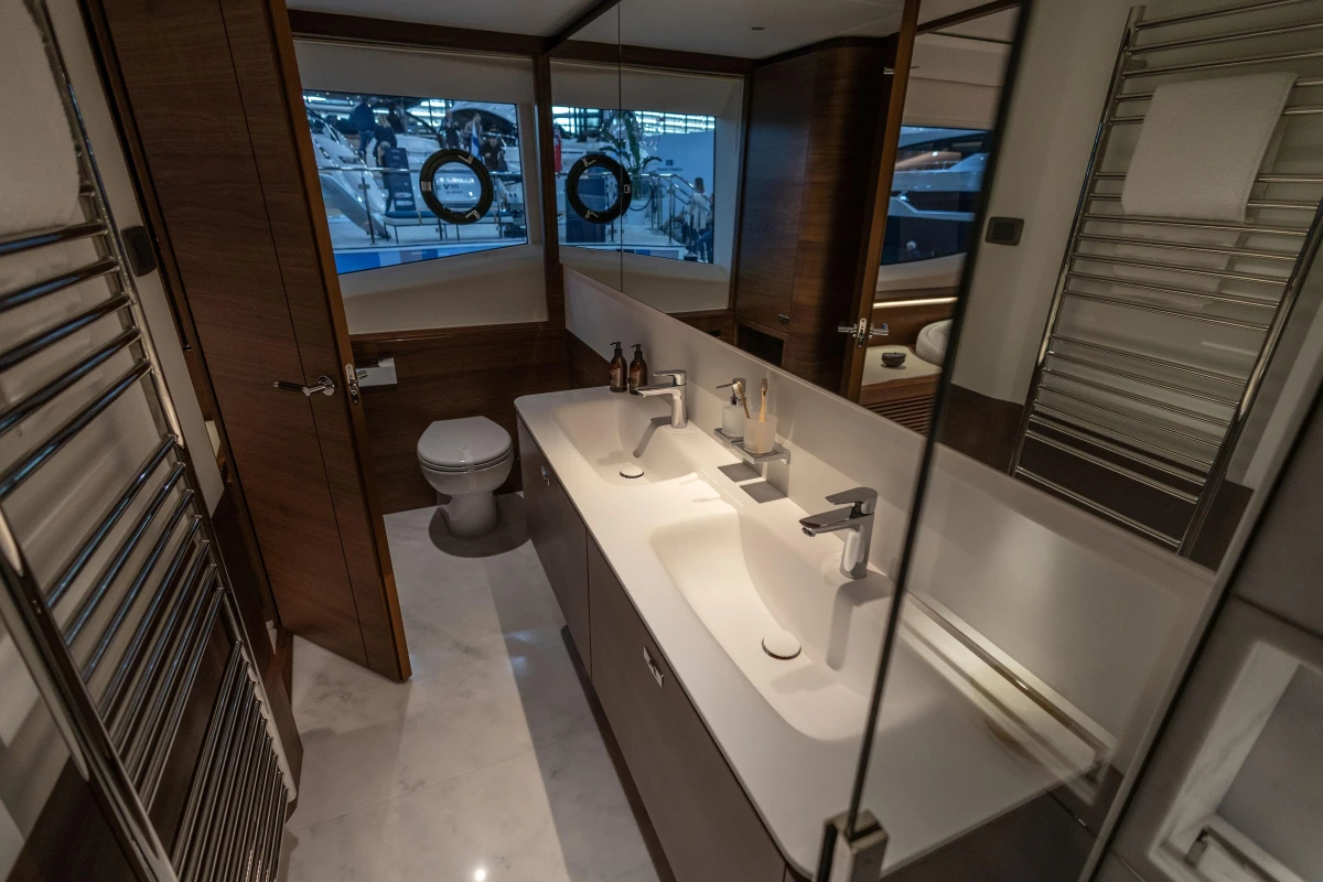 Luxurious bathroom in 2026 Princess X80 yacht with dual sinks and modern fixtures.
