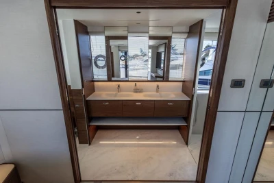 Luxurious bathroom interior of 2026 Princess X80 yacht with dual sinks and modern design.