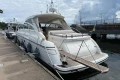2007 Princess V48 yacht docked at marina, featuring sleek design and luxury amenities.
