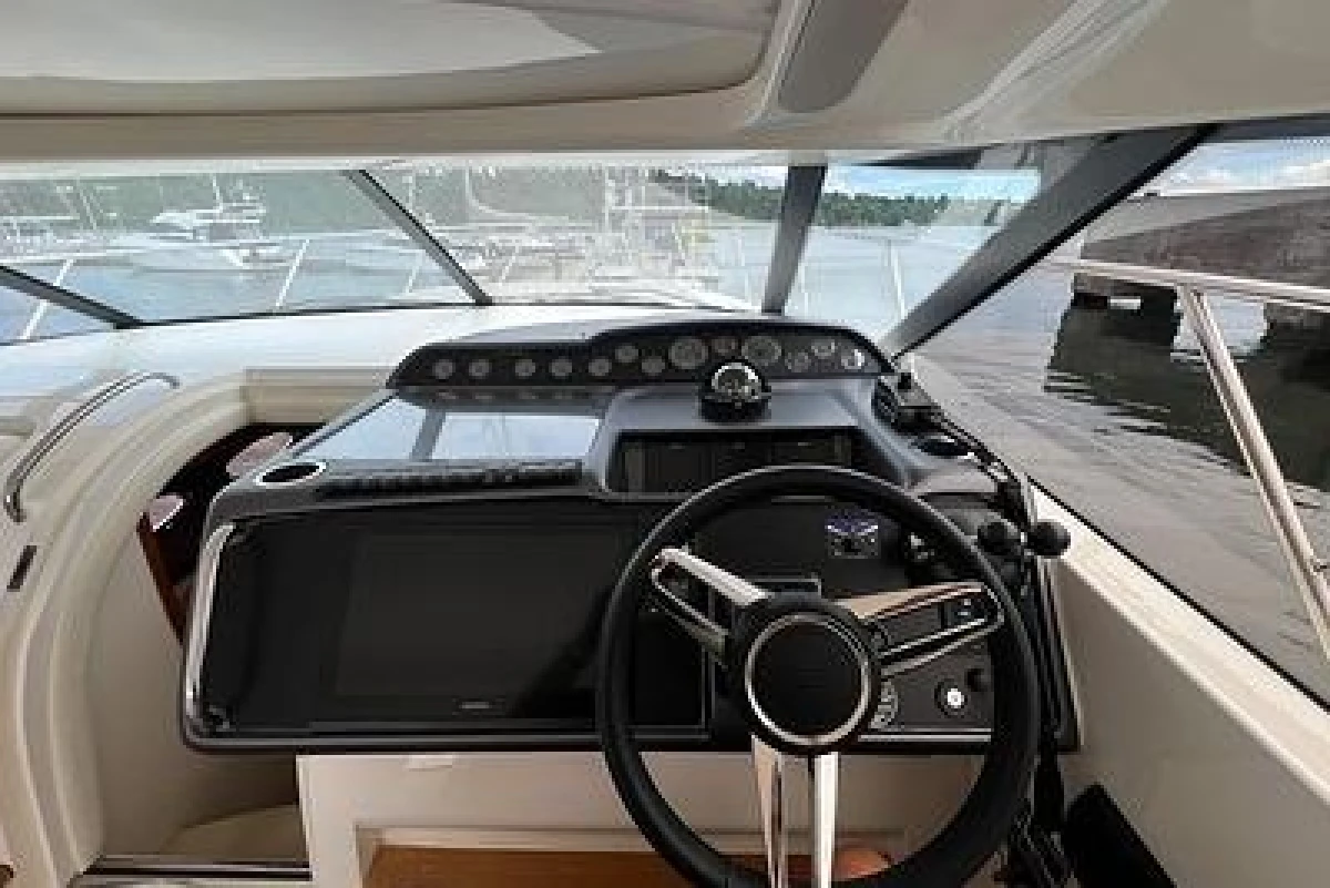 2007 Princess V48 yacht helm with modern controls and panoramic view.