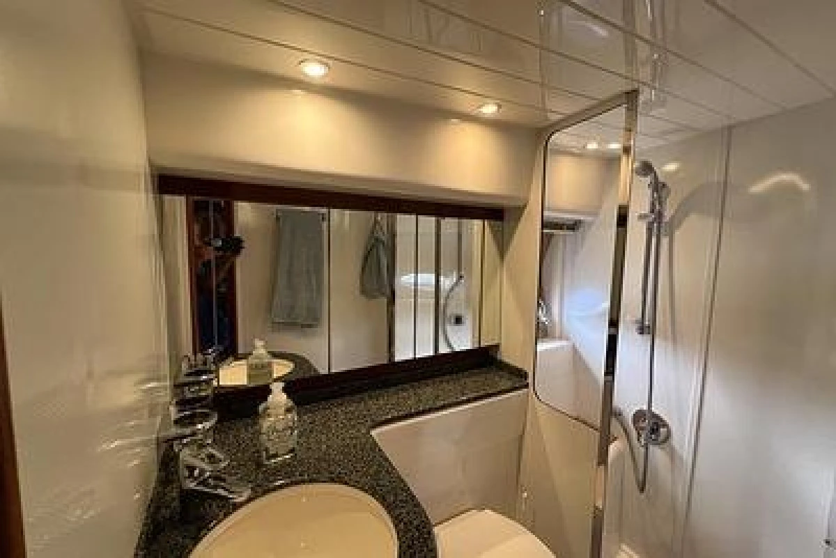 Luxurious bathroom in 2007 Princess V48 yacht with modern fixtures and elegant design.