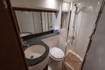 Luxurious bathroom in 2007 Princess V48 yacht with modern fixtures and elegant design.