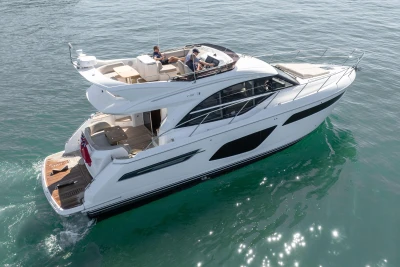 2022 Princess F50 yacht cruising on calm blue waters.