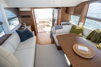 Luxurious interior of 2022 Princess F50 yacht with elegant seating and ocean view.