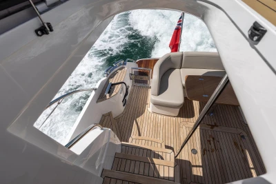 Luxurious 2022 Princess F50 yacht deck with elegant seating and ocean view.