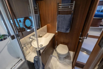 Luxurious bathroom in 2022 Princess F50 yacht with modern fixtures and elegant design.