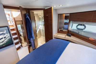 Luxurious interior of 2022 Princess F50 yacht with modern design and elegant wood finishes.