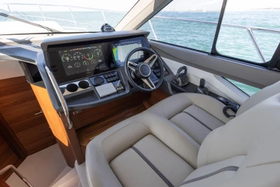 Luxurious 2022 Princess F50 yacht cockpit with advanced navigation system and plush seating.