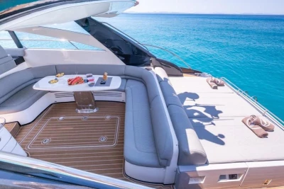 Luxurious 2005 Princess V58 yacht with elegant seating and ocean view.