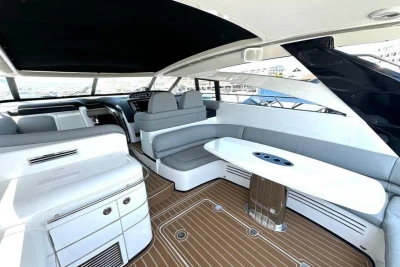 Luxurious interior of 2005 Princess V58 yacht with sleek seating and modern design.