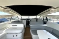 Interior of 2005 Princess V58 yacht, featuring sleek seating and modern design elements.