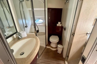 Luxurious bathroom in 2005 Princess V58 yacht with modern fixtures and elegant design.
