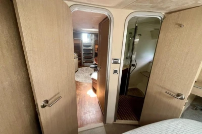 Interior of 2005 Princess V58 yacht showing cabin and bathroom doors.