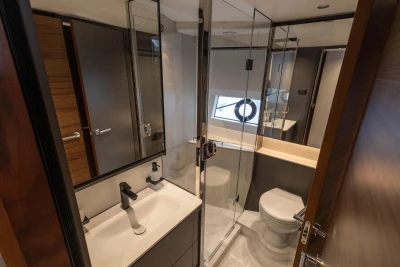 Luxurious bathroom in 2025 Princess S65 yacht with modern fixtures and elegant design.